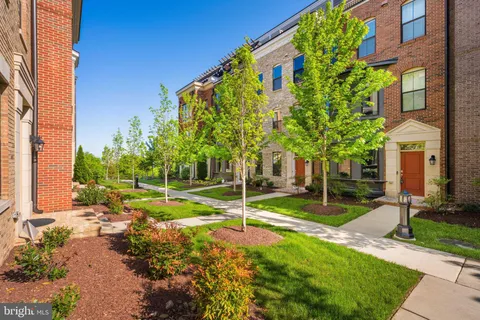 a view of entryway with stairs and wooden floor