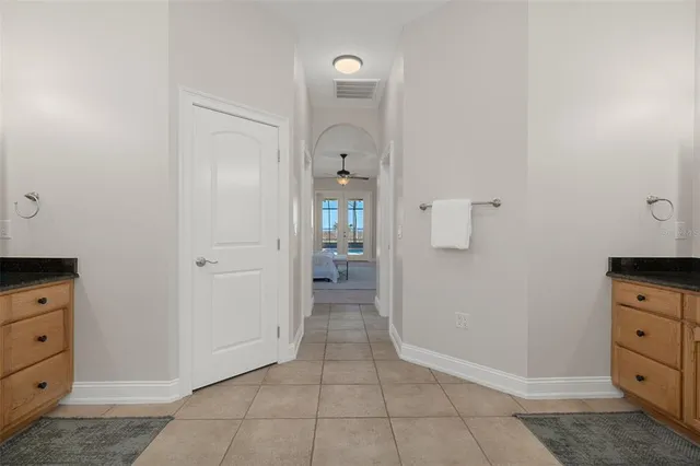 a kitchen with stainless steel appliances granite countertop a refrigerator sink and cabinets