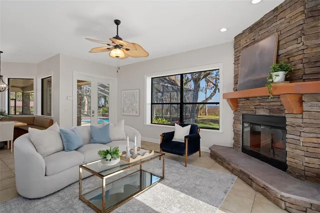 a view of a big room with a big yard and potted plants