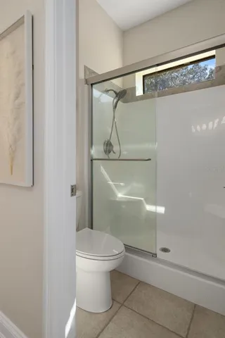 a view of a swimming pool with lounge chair