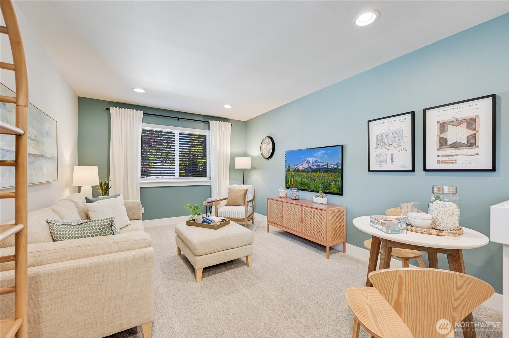 19221 Meridian Drive Southeast, Unit CW 16 Bothell, WA 98012 - Photo 20 of 37 a living room with furniture and a flat screen tv