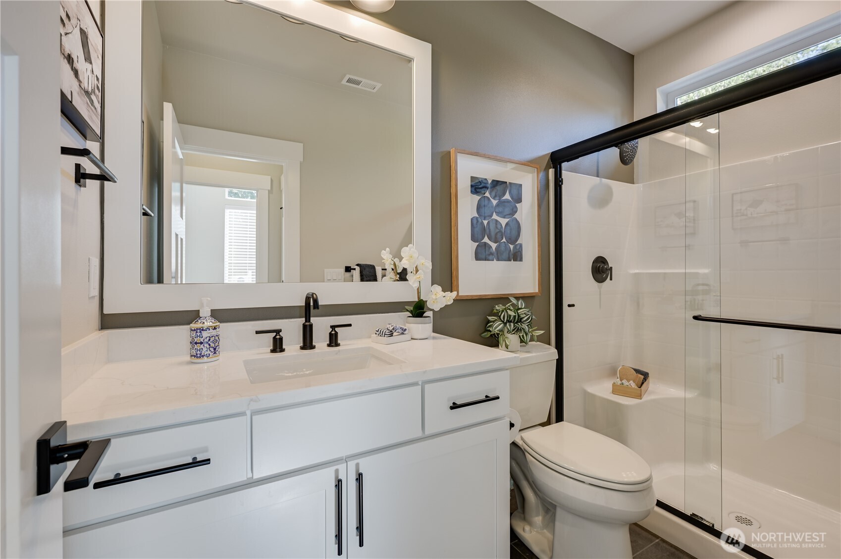 19221 Meridian Drive Southeast, Unit CW 16 Bothell, WA 98012 - Photo 5 of 37 a bathroom with a sink toilet and shower