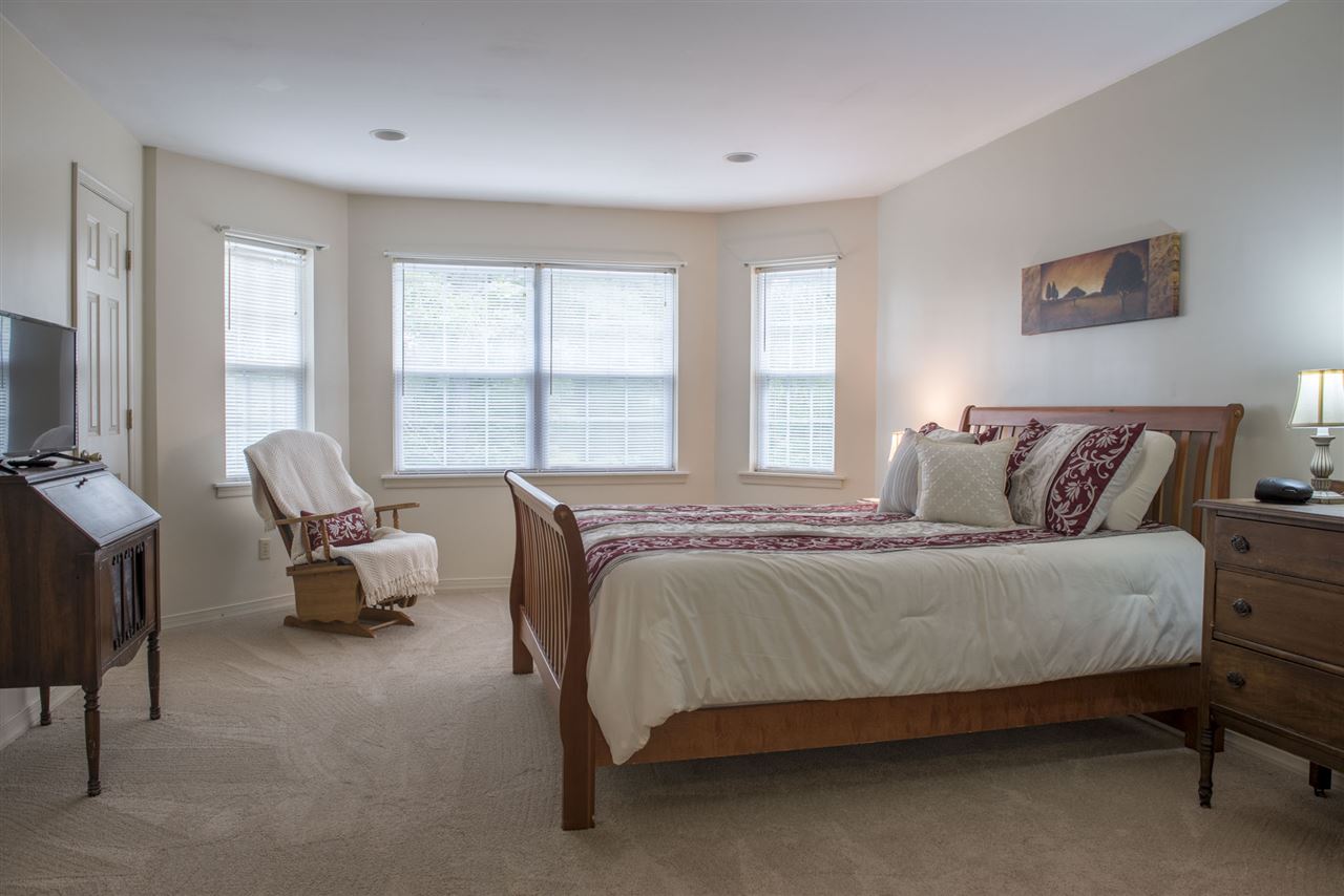 1380 New Hope Road Staunton, VA 24401 - Photo 13 of 28 a bedroom with a bed and a couch