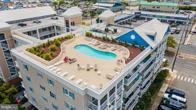 a view of a chairs and table in the patio