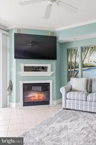 a kitchen with granite countertop a refrigerator and a sink
