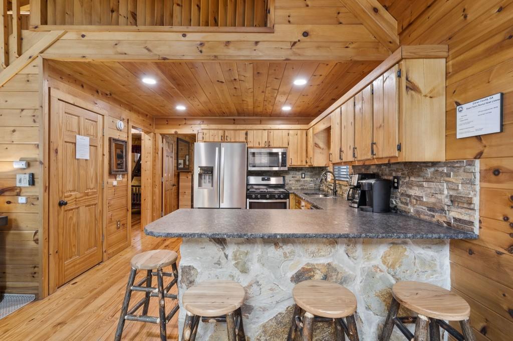 77 Old Covered Bridge Road Cherry Log, GA 30522 - Photo 11 of 40 a dining table with chairs
