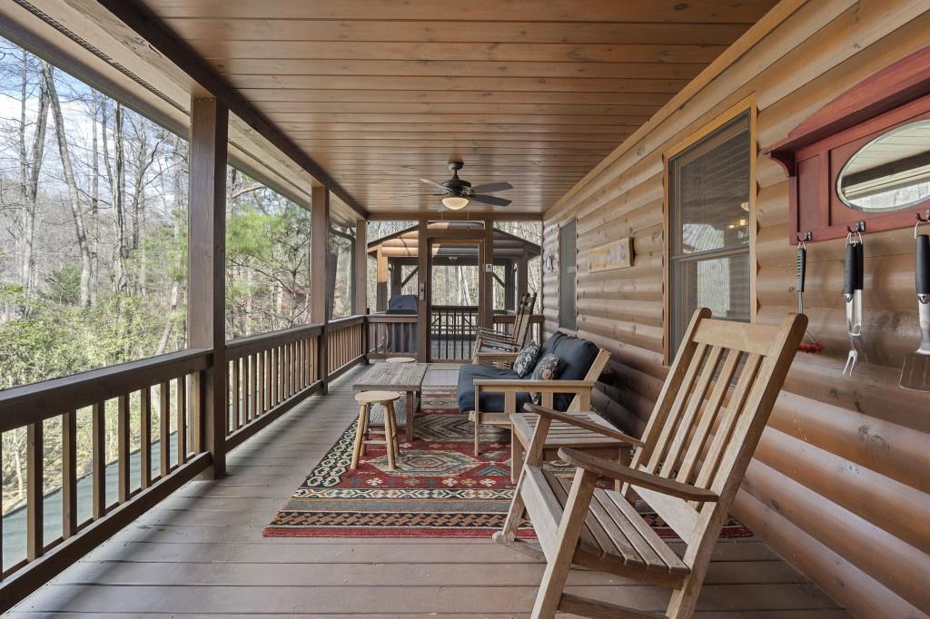 77 Old Covered Bridge Road Cherry Log, GA 30522 - Photo 14 of 40 a view of a patio with table and chairs