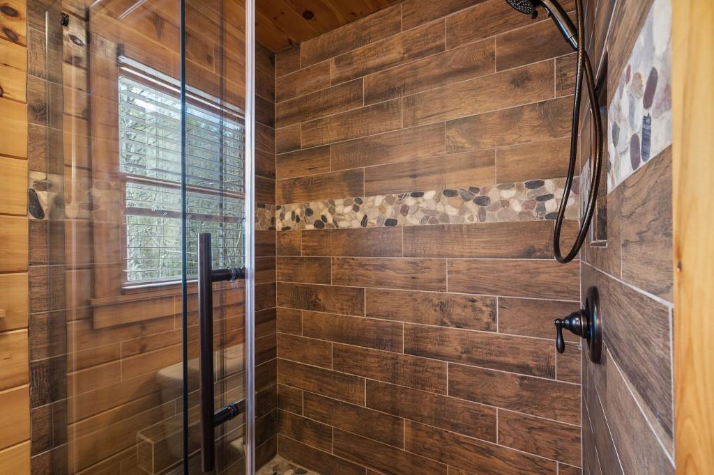 77 Old Covered Bridge Road Cherry Log, GA 30522 - Photo 18 of 40 a bathroom with a shower
