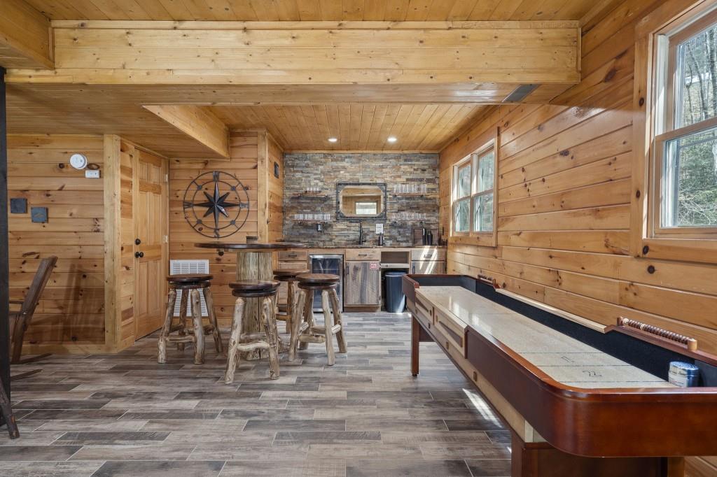 77 Old Covered Bridge Road Cherry Log, GA 30522 - Photo 25 of 40 a kitchen with stainless steel appliances wooden cabinets and a granite counter tops
