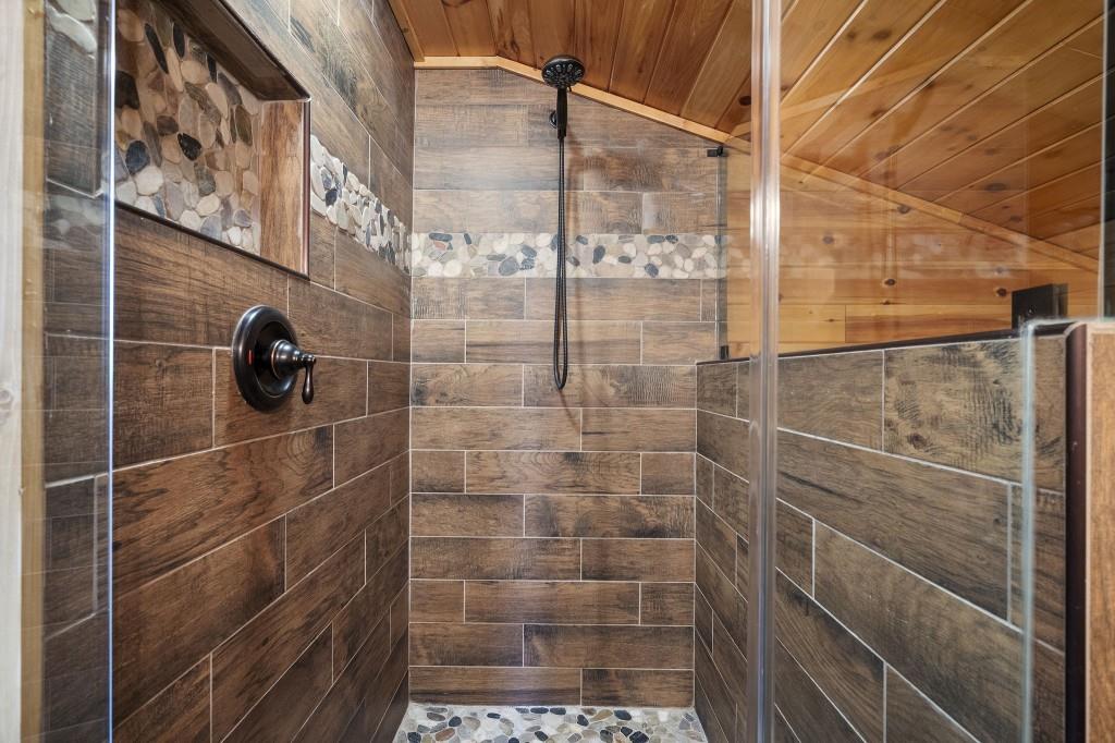 77 Old Covered Bridge Road Cherry Log, GA 30522 - Photo 32 of 40 a bathroom with a shower