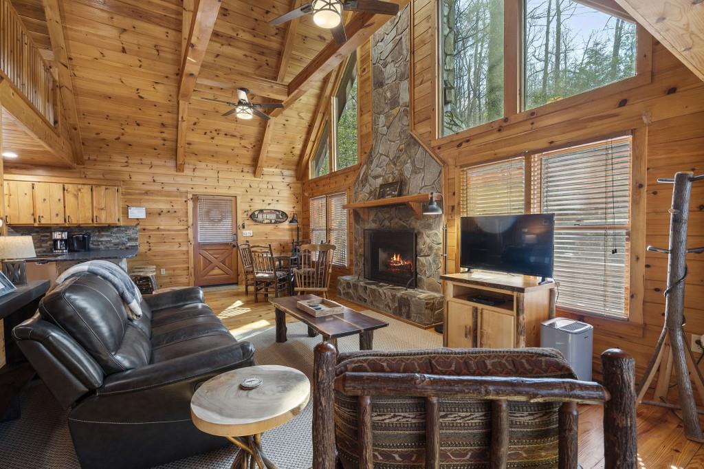 77 Old Covered Bridge Road Cherry Log, GA 30522 - Photo 7 of 40 a outdoor living space with furniture and a flat screen tv