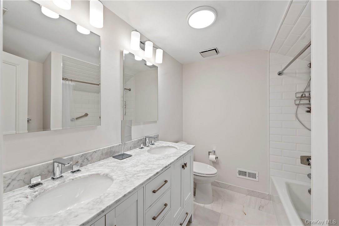 40 Meadow Road Scarsdale, NY 10583 - Photo 23 of 40 Hall Bathroom with double vanity