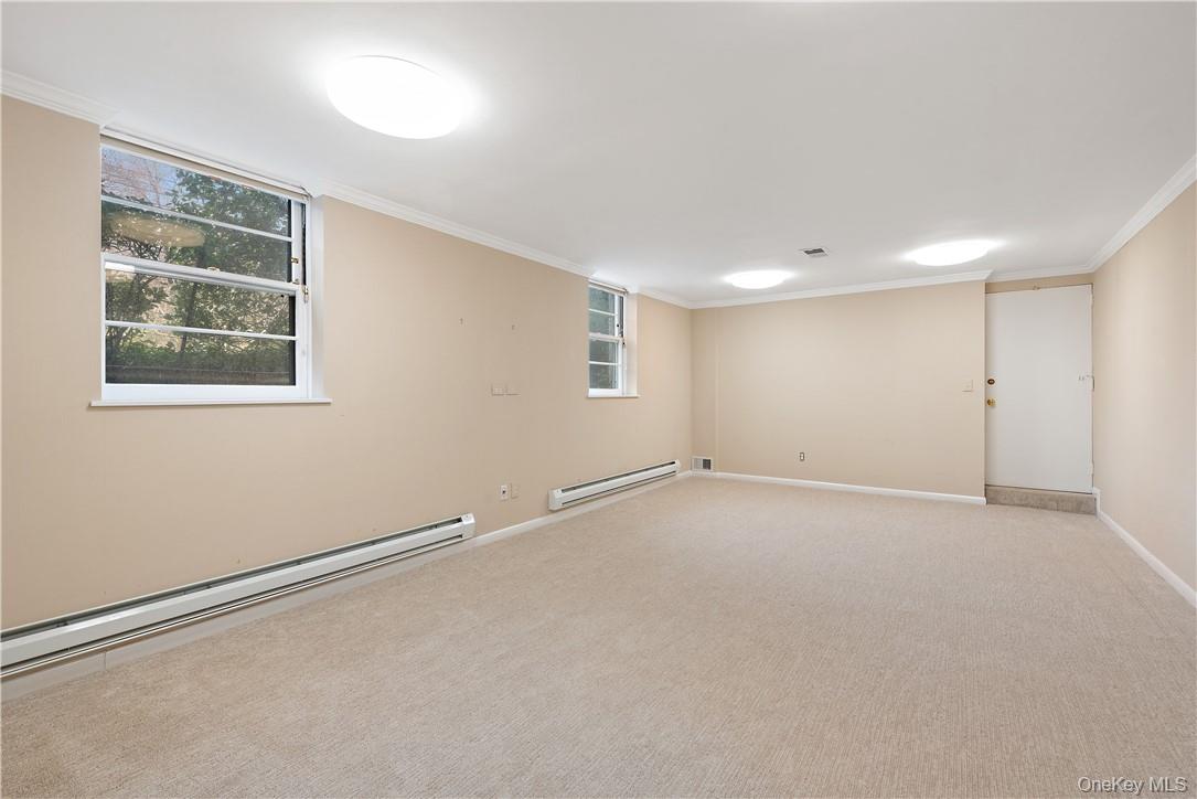 40 Meadow Road Scarsdale, NY 10583 - Photo 32 of 40 Lower level recreation room and walk out to