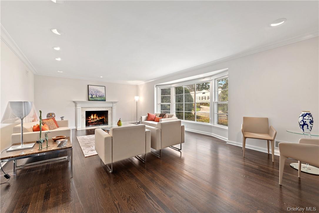 40 Meadow Road Scarsdale, NY 10583 - Photo 7 of 40 Living room view with woddburning fireplace