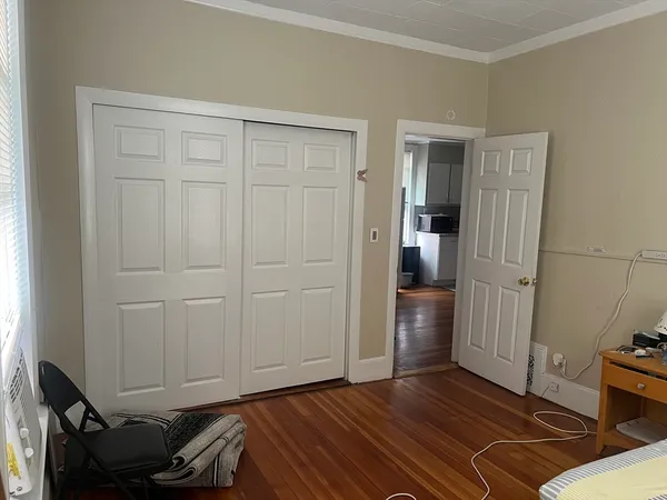 a view of livingroom with furniture and empty room