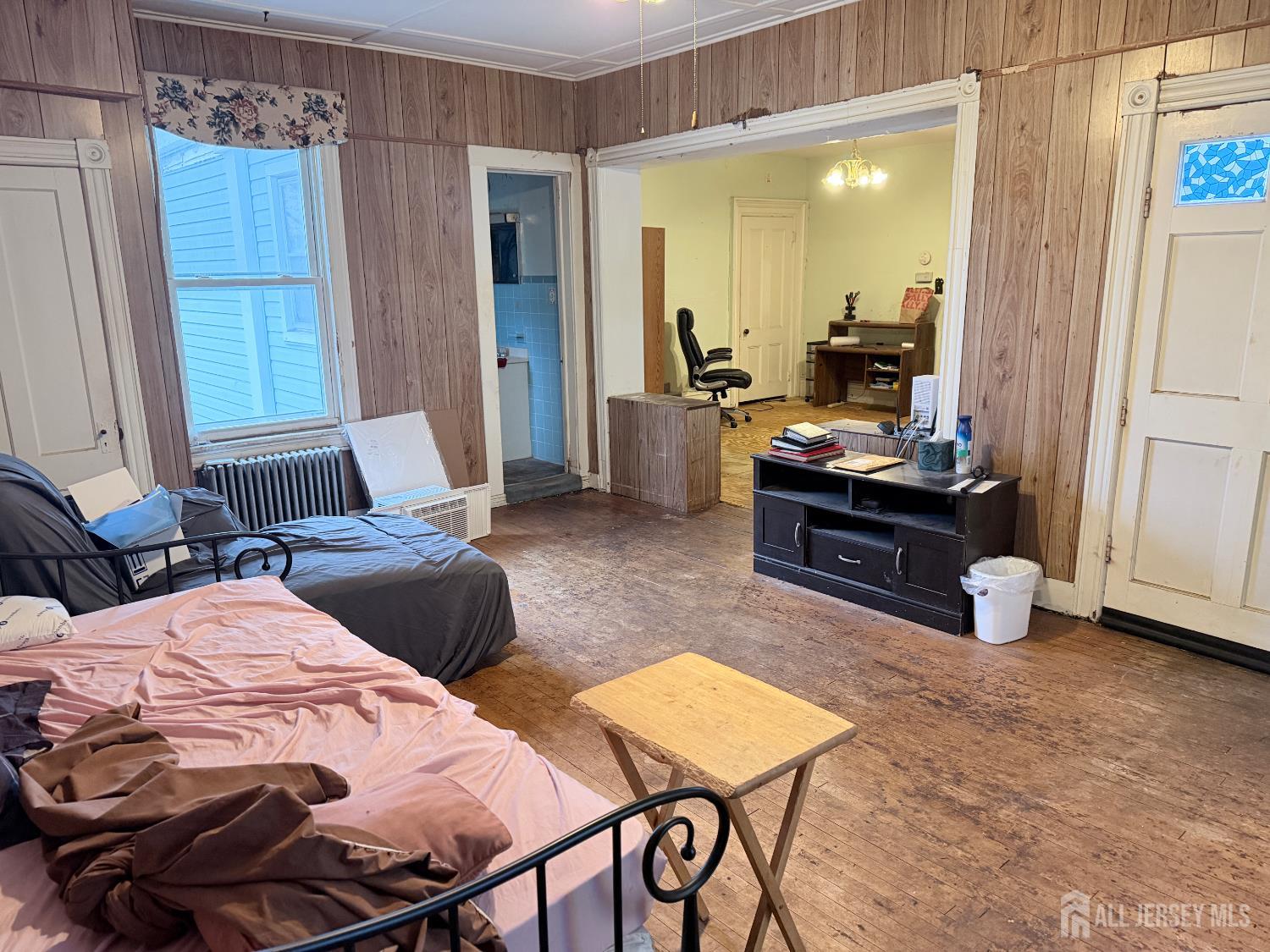 41 Atlantic Street Keyport, NJ 07735 - Photo 17 of 48 a bedroom with furniture and a window