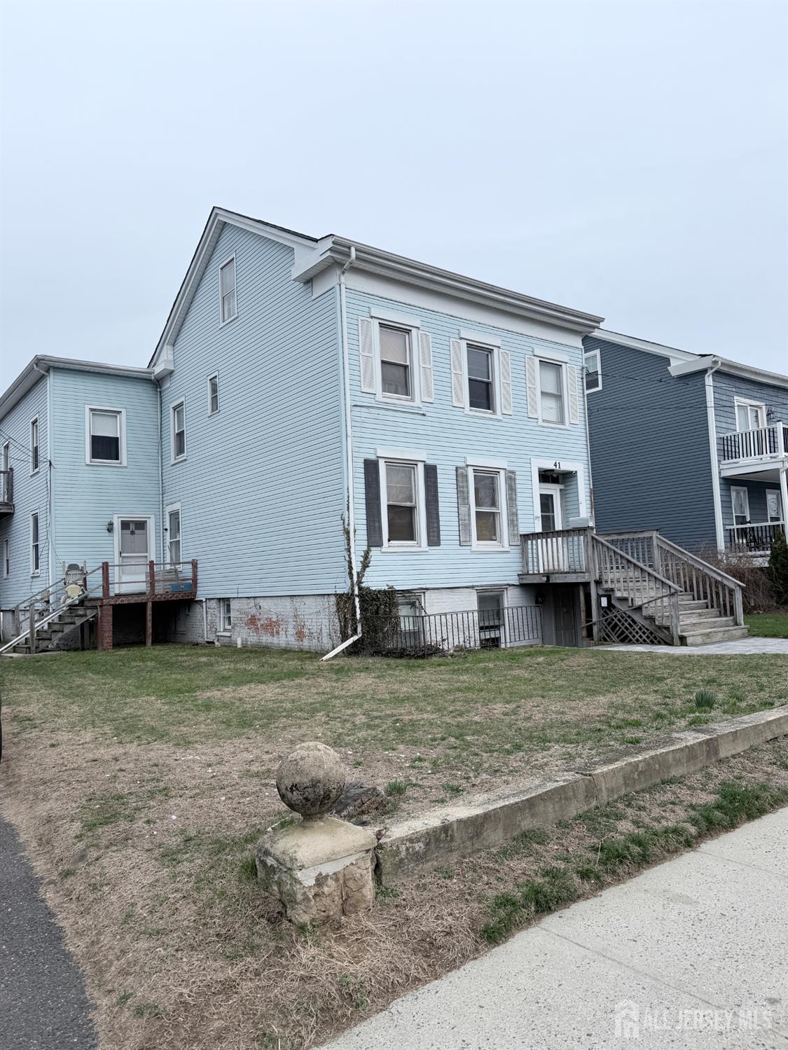 41 Atlantic Street Keyport, NJ 07735 - Photo 38 of 48 a view of a house with backyard