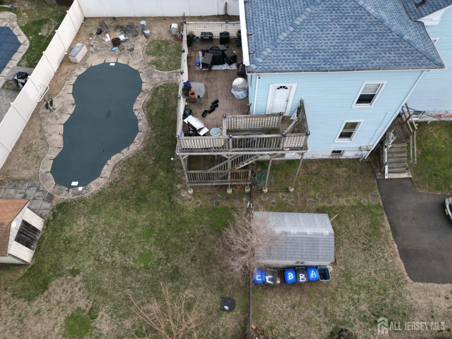 41 Atlantic Street Keyport, NJ 07735 - Photo 43 of 48 an aerial view of a house with swimming pool