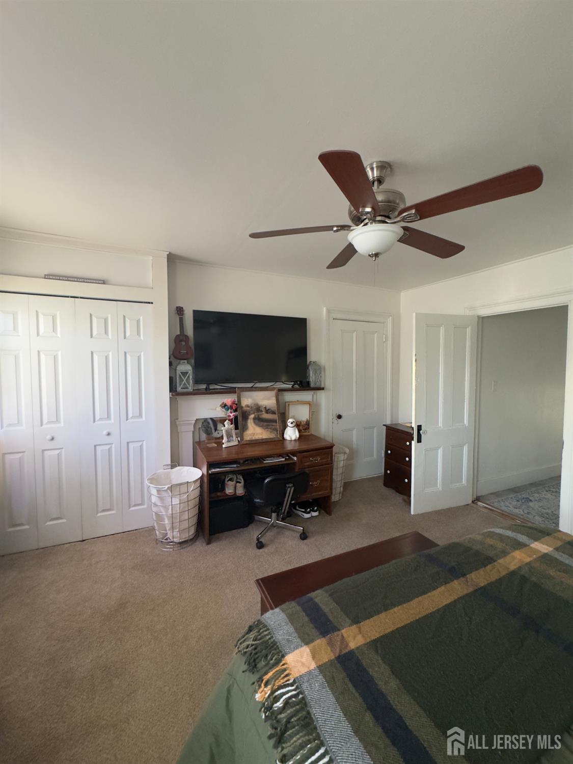 41 Atlantic Street Keyport, NJ 07735 - Photo 5 of 48 a living room with furniture and a flat screen tv