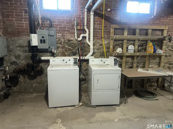 a utility room with dryer and washer