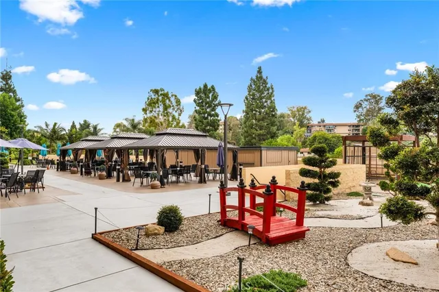 a view of a chairs and tables in the patio