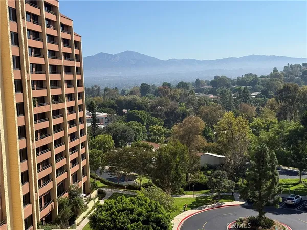 a view of a city with tall buildings
