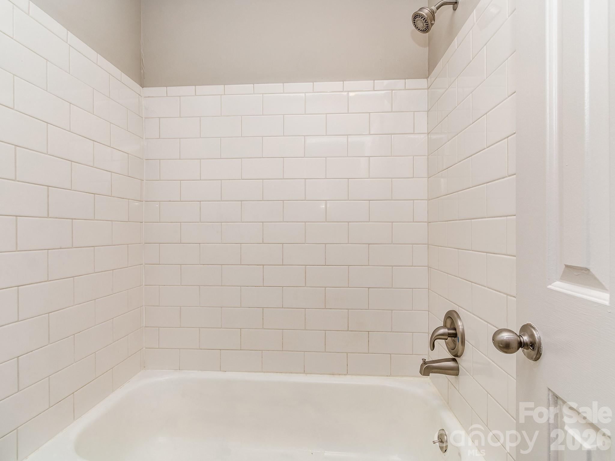 8211 Golf Ridge Drive Charlotte, NC 28277 - Photo 22 of 40 a bathroom with a bathtub