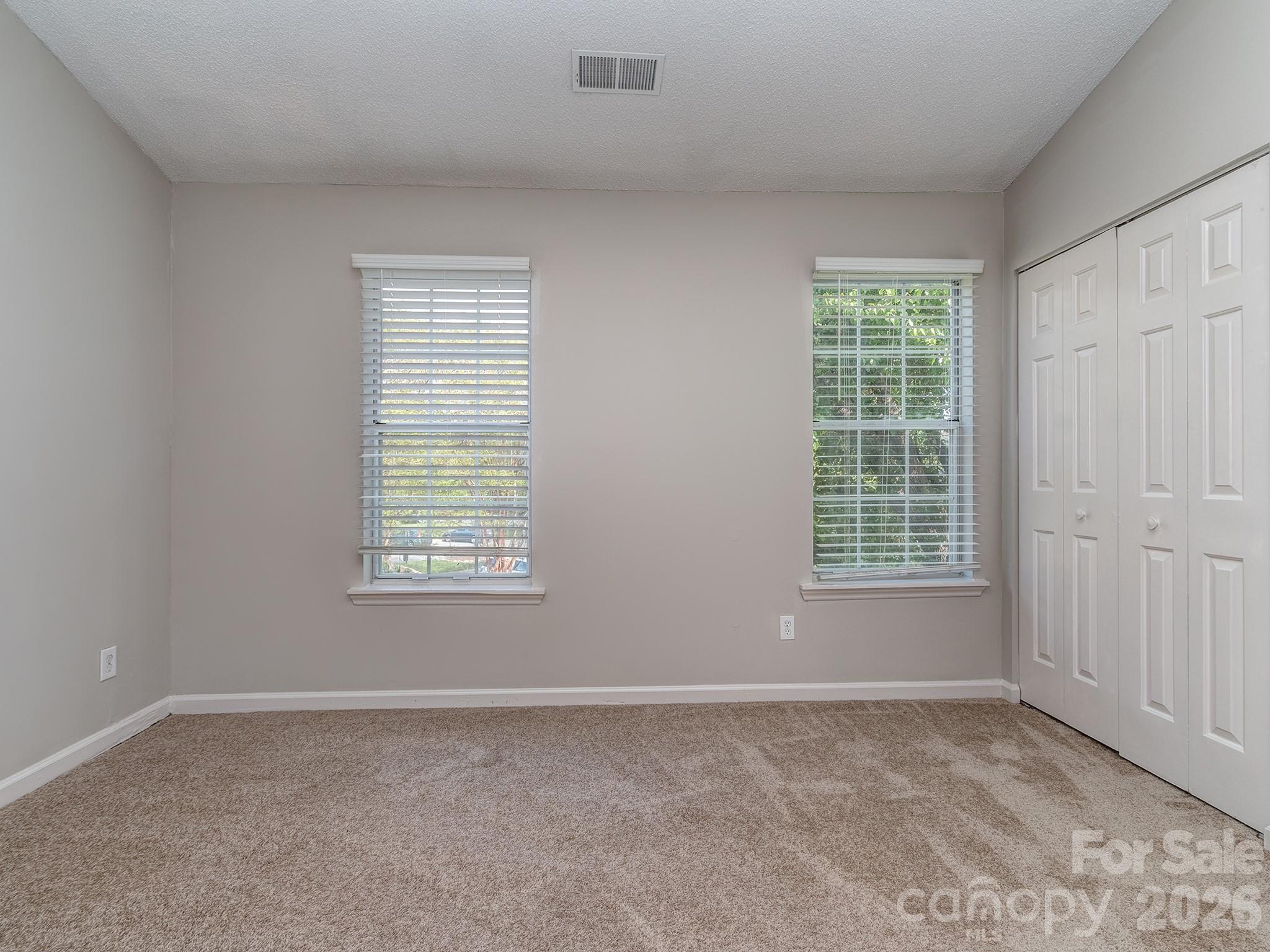 8211 Golf Ridge Drive Charlotte, NC 28277 - Photo 23 of 40 an empty room with a window