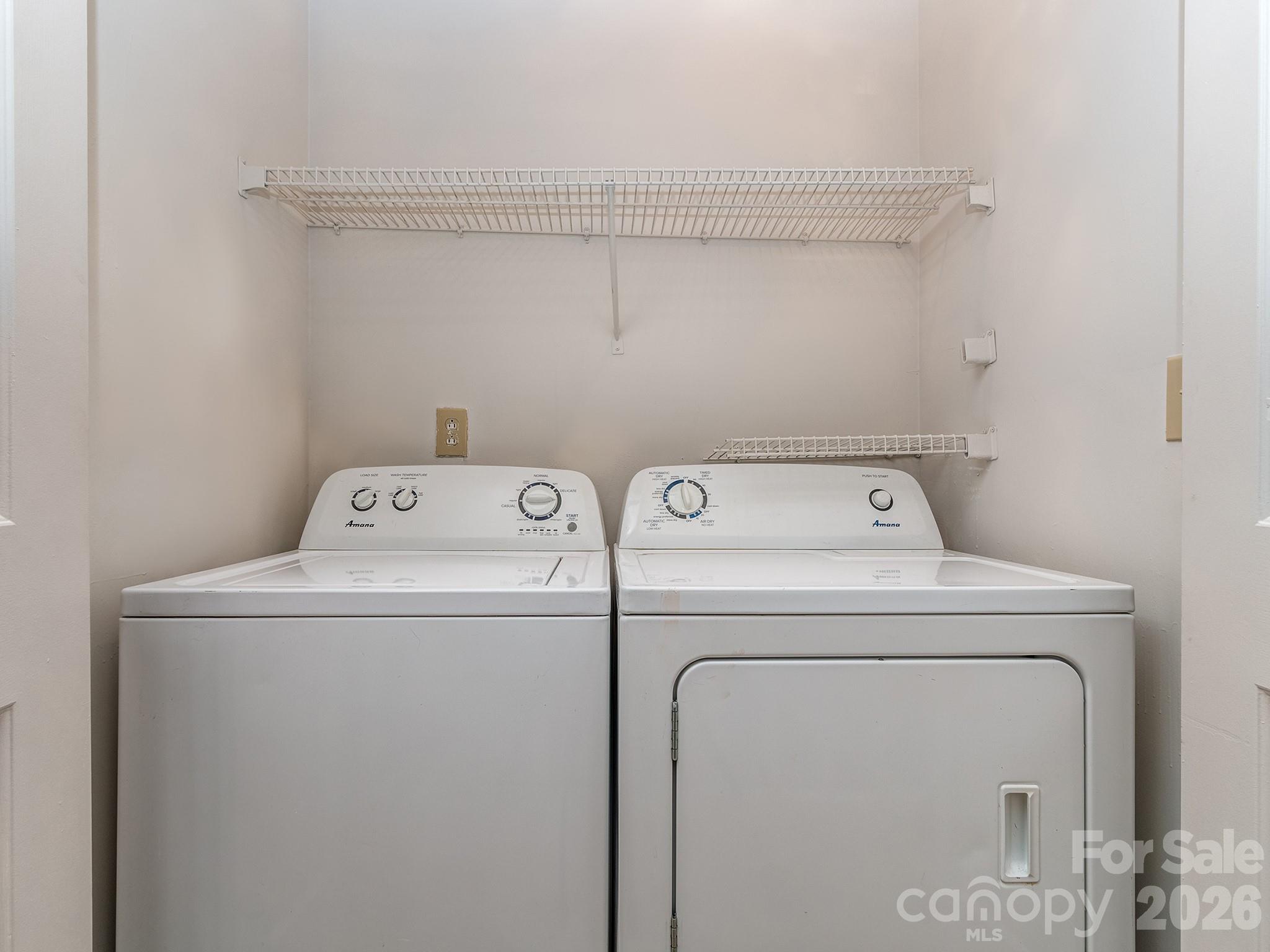 8211 Golf Ridge Drive Charlotte, NC 28277 - Photo 29 of 40 a utility room with dryer and washer
