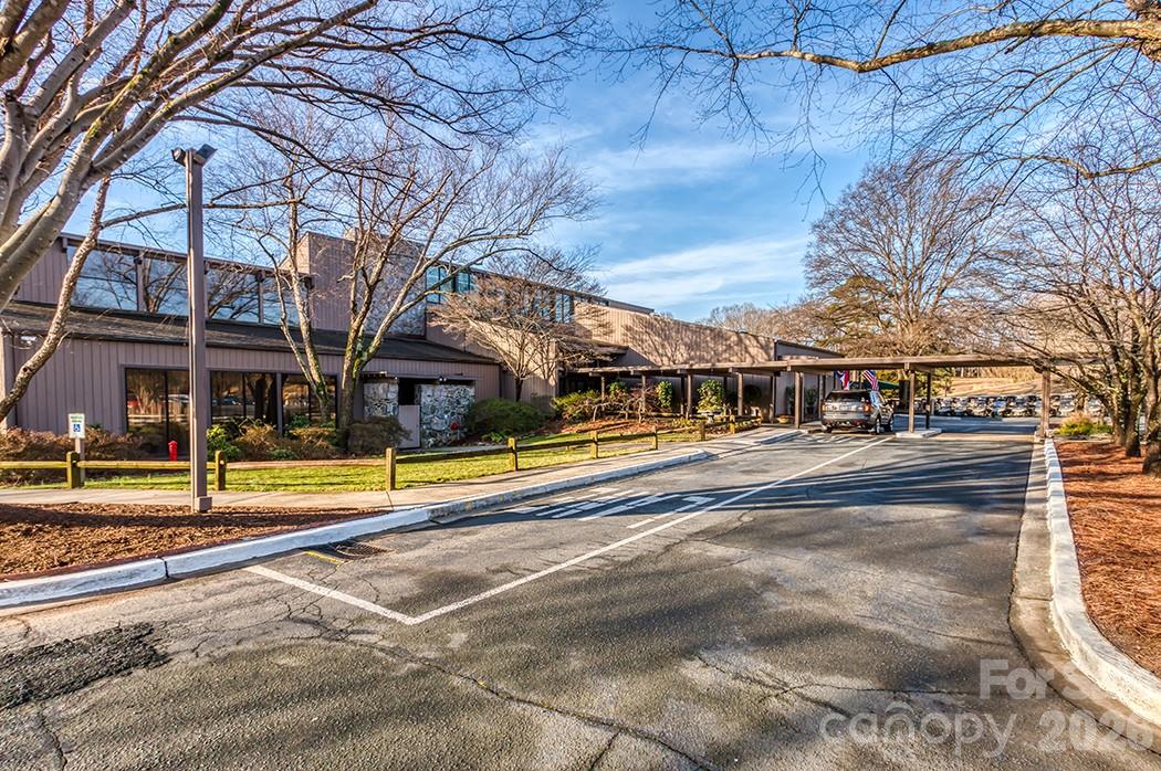 8211 Golf Ridge Drive Charlotte, NC 28277 - Photo 35 of 40 a view of a building with a park