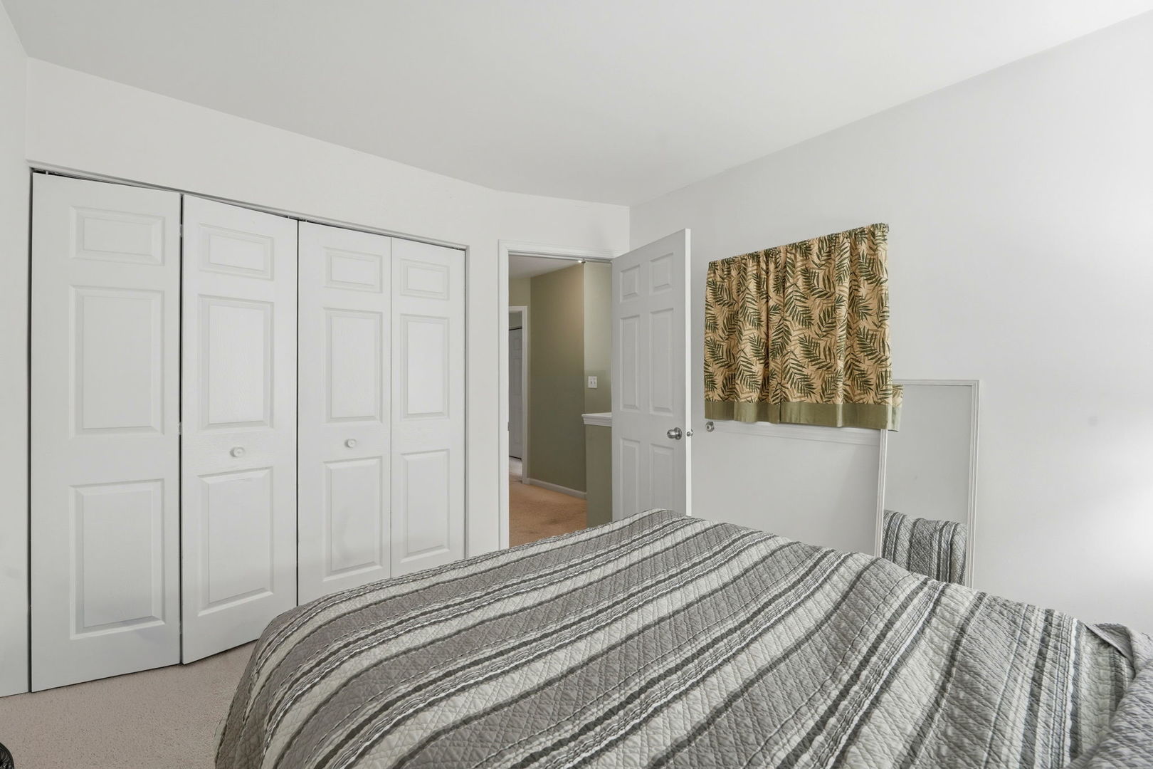 8 St Regis Court Elmhurst, IL 60126 - Photo 11 of 23 a bedroom with a bed and a window