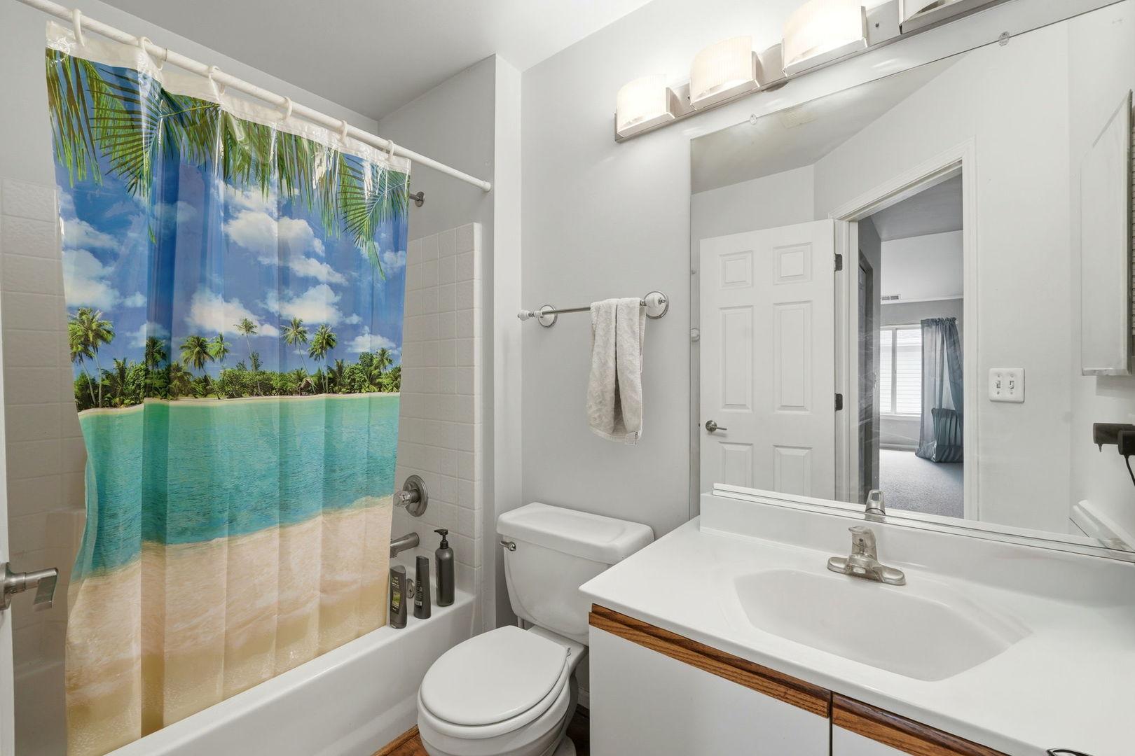 8 St Regis Court Elmhurst, IL 60126 - Photo 14 of 23 a bathroom with a sink toilet and shower