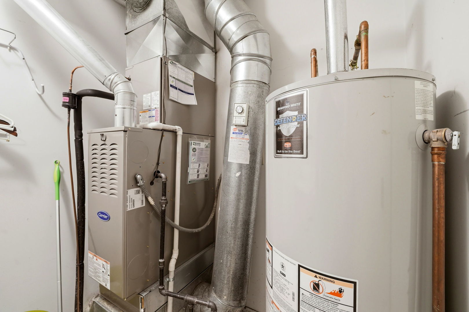 8 St Regis Court Elmhurst, IL 60126 - Photo 16 of 23 a utility room with multiple dryer