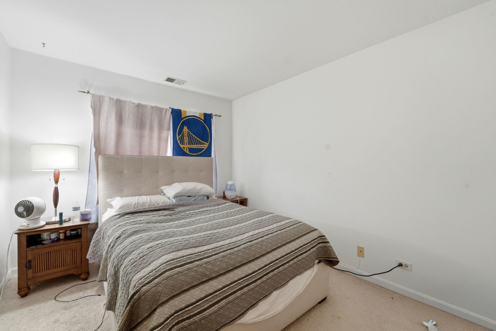 8 St Regis Court Elmhurst, IL 60126 - Photo 10 of 23 a bedroom with a bed and a lamp