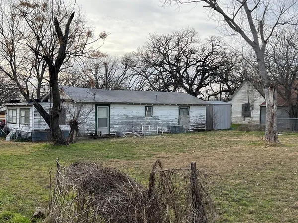 a house view with a garden space