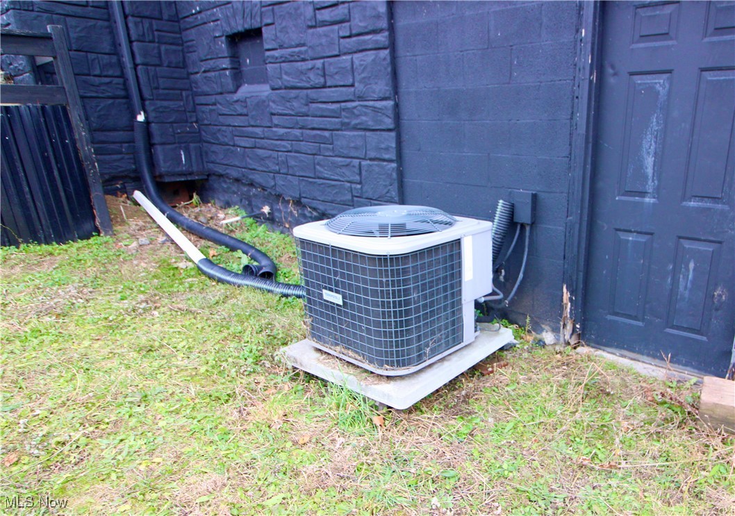 15580 Rittman Road Rittman, OH 44270 - Photo 10 of 11 Exterior view of a central AC unit