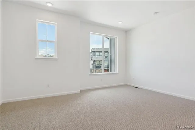 an empty room with windows
