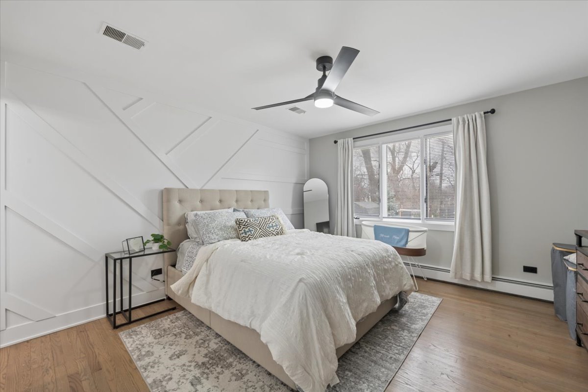 571 Byrd Road Riverside, IL 60546 - Photo 11 of 31 a bedroom with a bed and a window