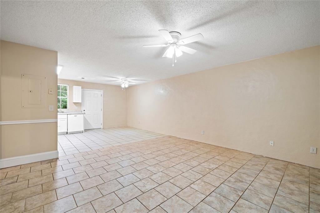 1628 Rockmart Road Villa Rica, GA 30180 - Photo 7 of 40 a view of an empty room and window