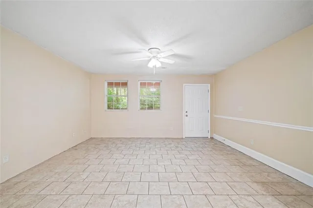 a view of an empty room and window