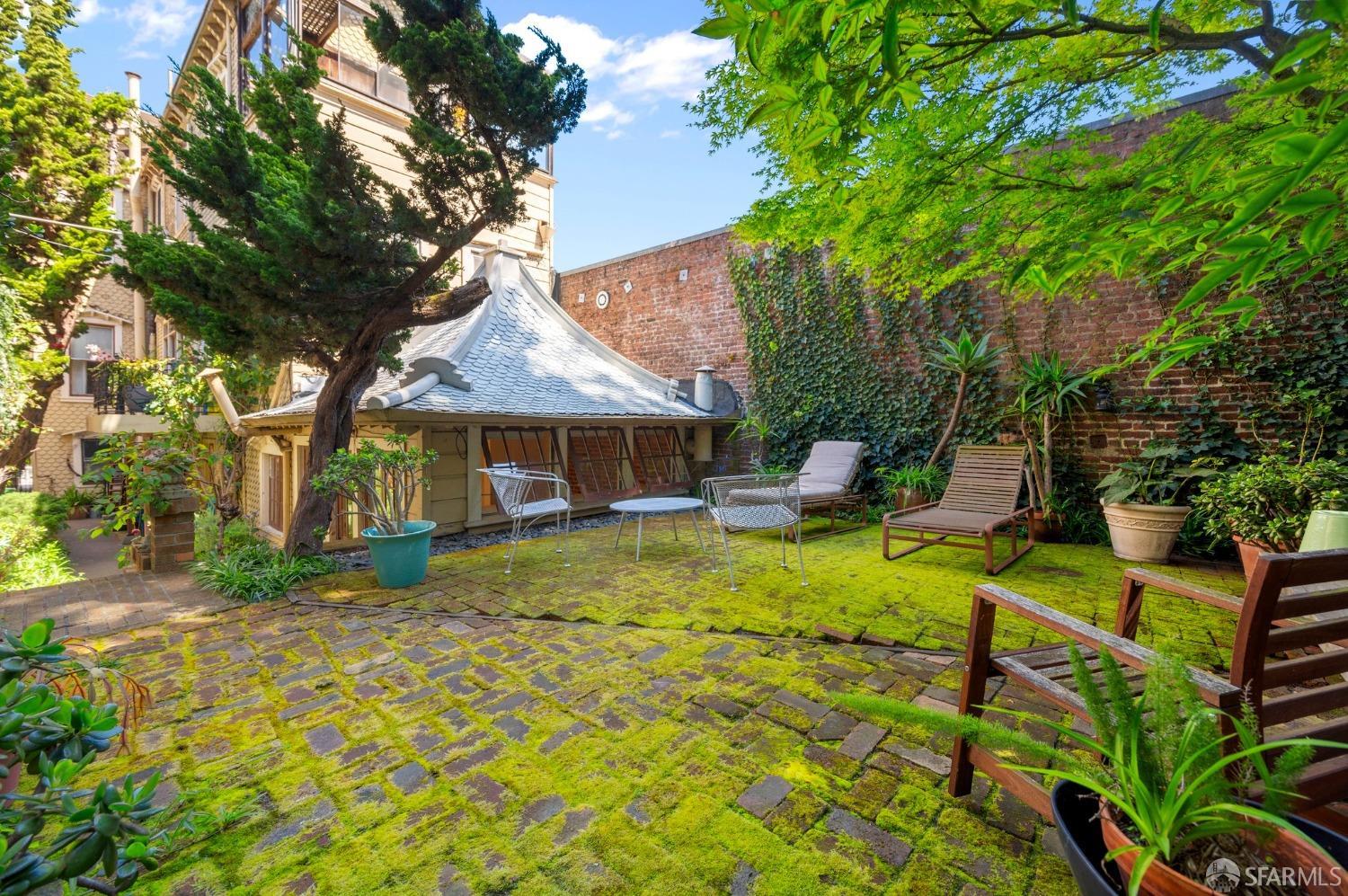 1659 Jackson Street San Francisco, CA 94109 - Photo 20 of 27 a front view of a house with garden