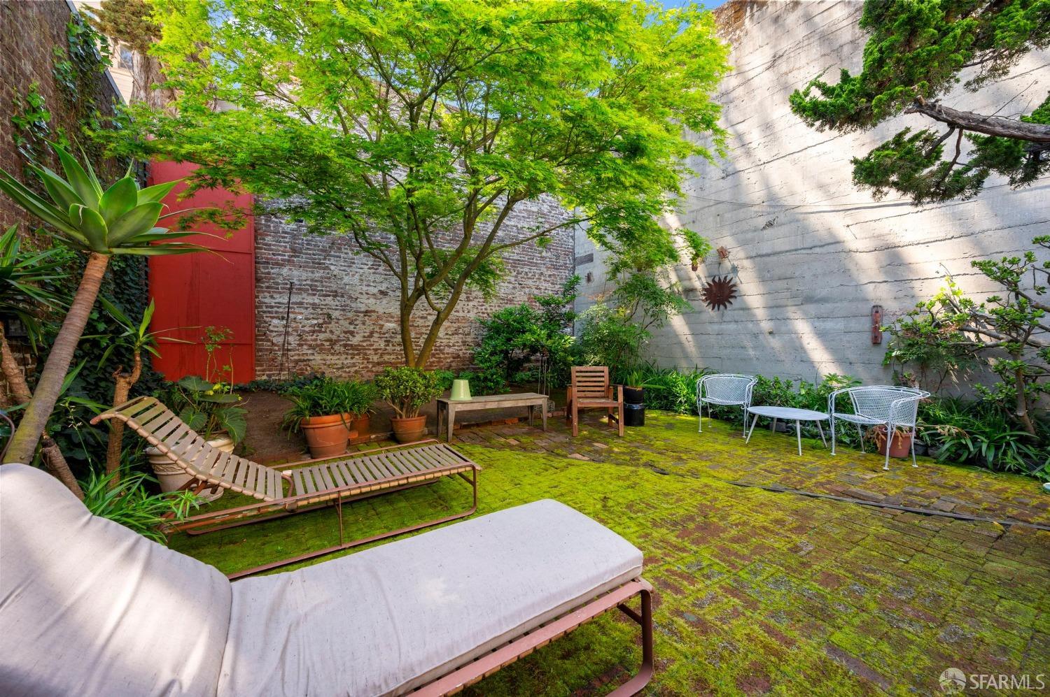 1659 Jackson Street San Francisco, CA 94109 - Photo 22 of 27 a view of a backyard with sitting area