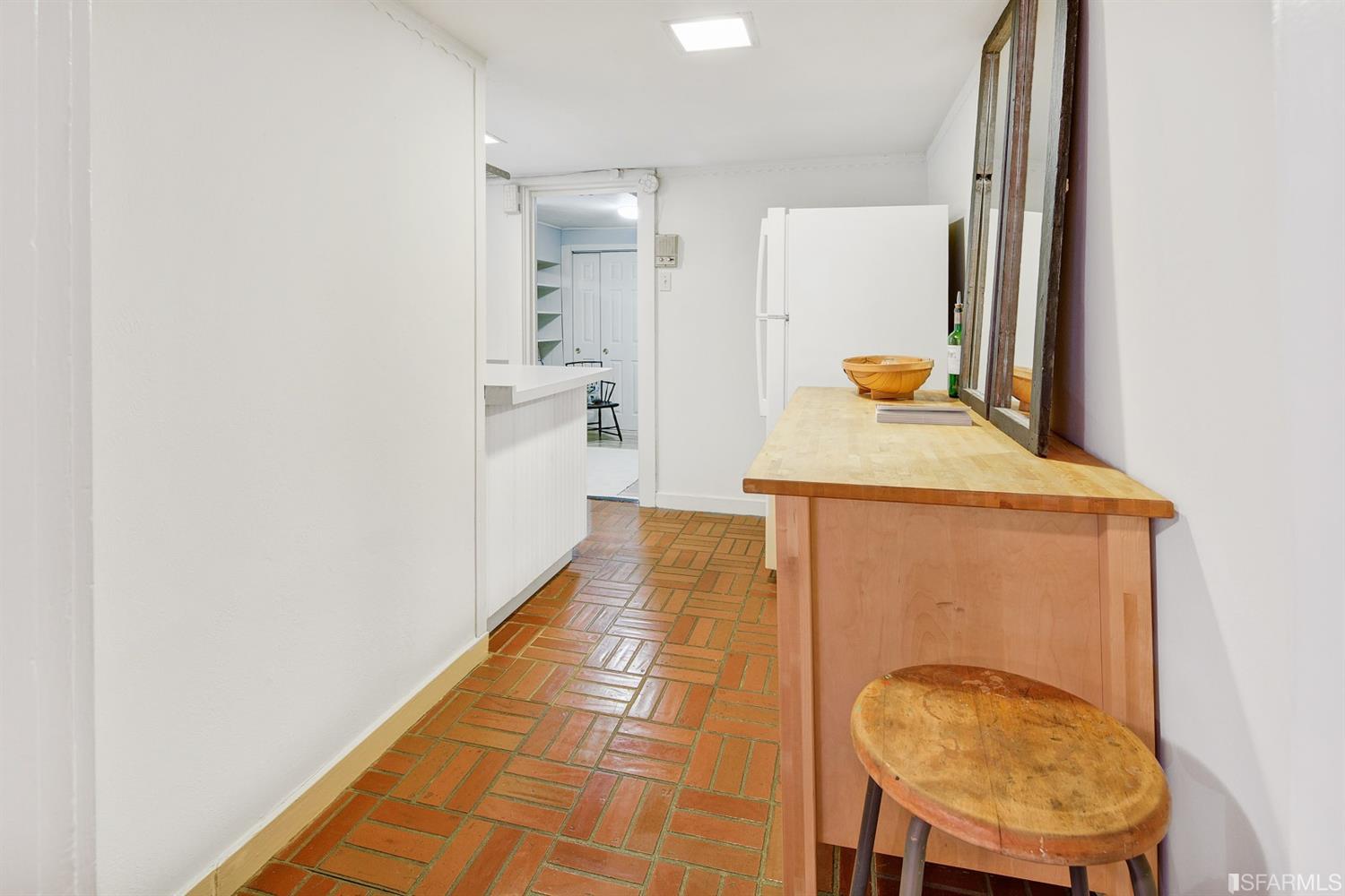 1659 Jackson Street San Francisco, CA 94109 - Photo 7 of 27 a bathroom with a sink and a mirror
