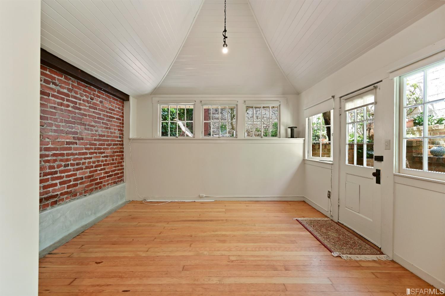 1659 Jackson Street San Francisco, CA 94109 - Photo 9 of 27 a view of an empty room with a window