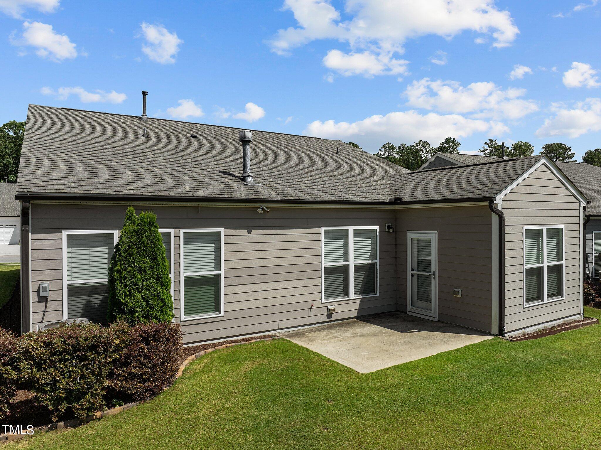 1013 Calista Drive Wake Forest, NC 27587 - Photo 29 of 40 a front view of a house with a yard