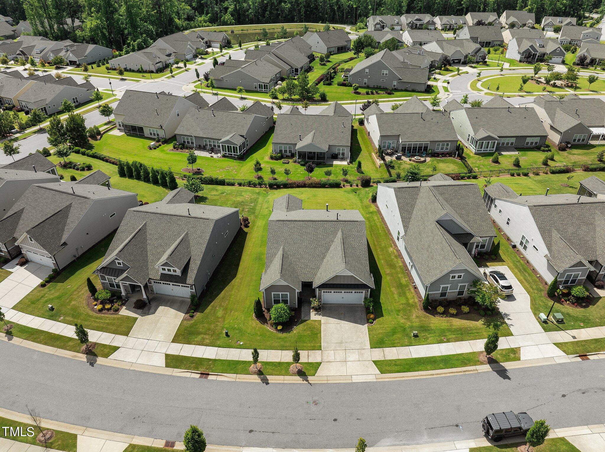 1013 Calista Drive Wake Forest, NC 27587 - Photo 32 of 40 an aerial view of houses with outdoor space