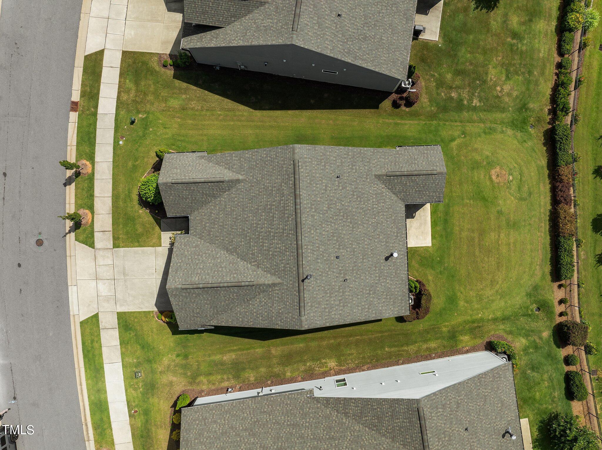 1013 Calista Drive Wake Forest, NC 27587 - Photo 36 of 40 an aerial view of a house with a yard
