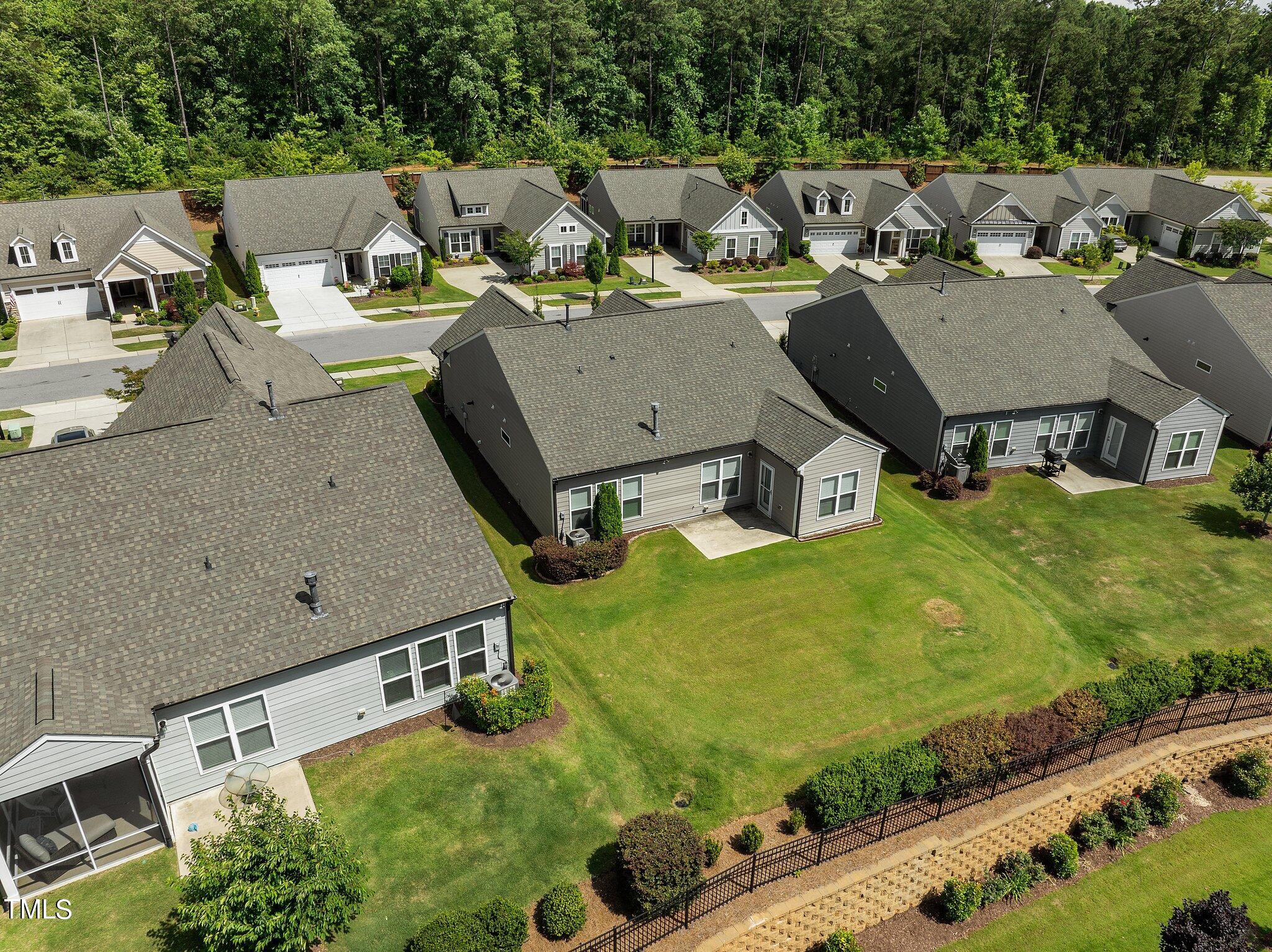 1013 Calista Drive Wake Forest, NC 27587 - Photo 39 of 40 an aerial view of residential houses with yard