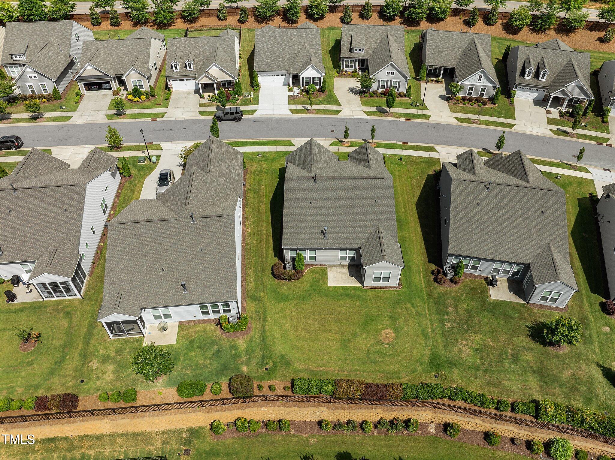 1013 Calista Drive Wake Forest, NC 27587 - Photo 40 of 40 an aerial view of residential houses with outdoor space