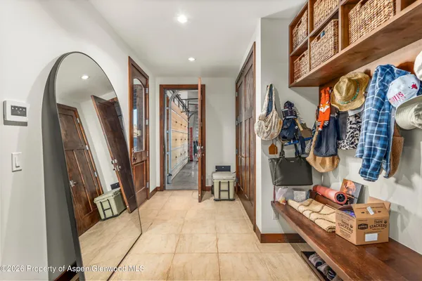 a view of a livingroom with furniture and entryway
